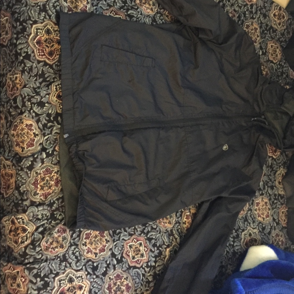 A Black Volcom Windbreaker